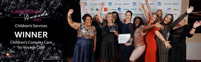Children's Complex Care - winners in Children Services category at the 2022 LaingBuisson awards! Image of team celebrating with their arms in the air!